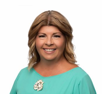 Portrait of Clare Merrick, REALTOR®.